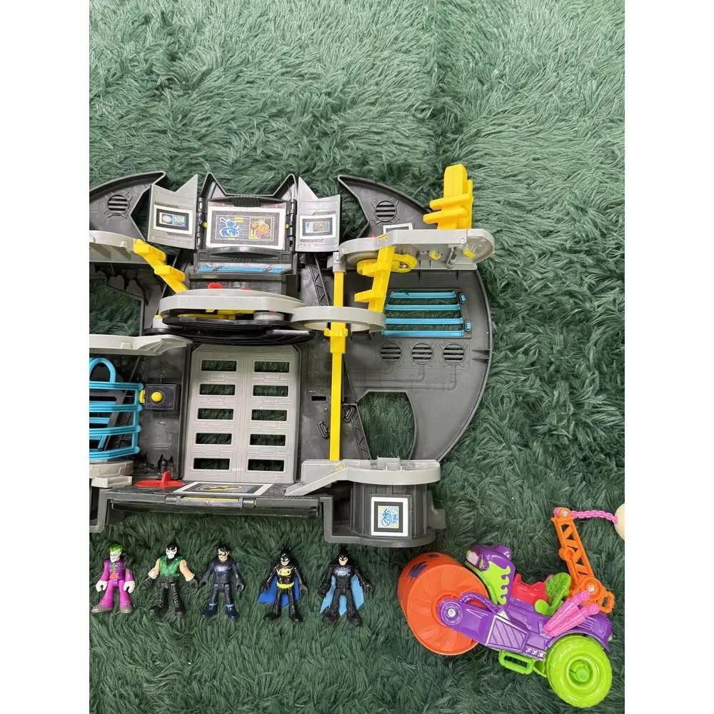 Fisher-Price Imaginext DC Super Friends Batcave Playset with 5 Figures & Vehicle
